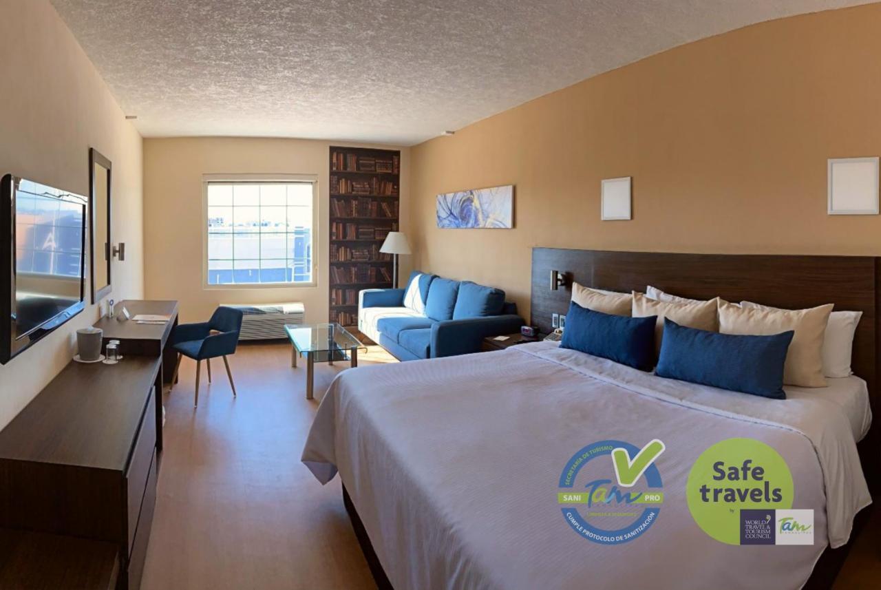 Habitación con cama extragrande.