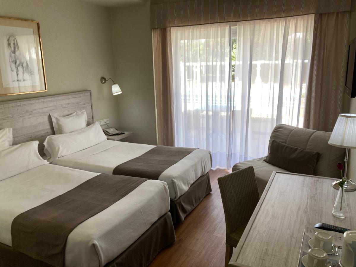 Double or Twin Room with Extra Bed (2 Adults + 1 Child)
