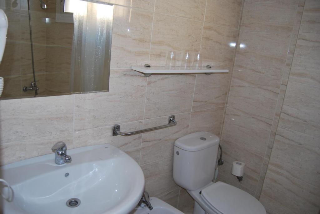 Habitación Triple con balcón
