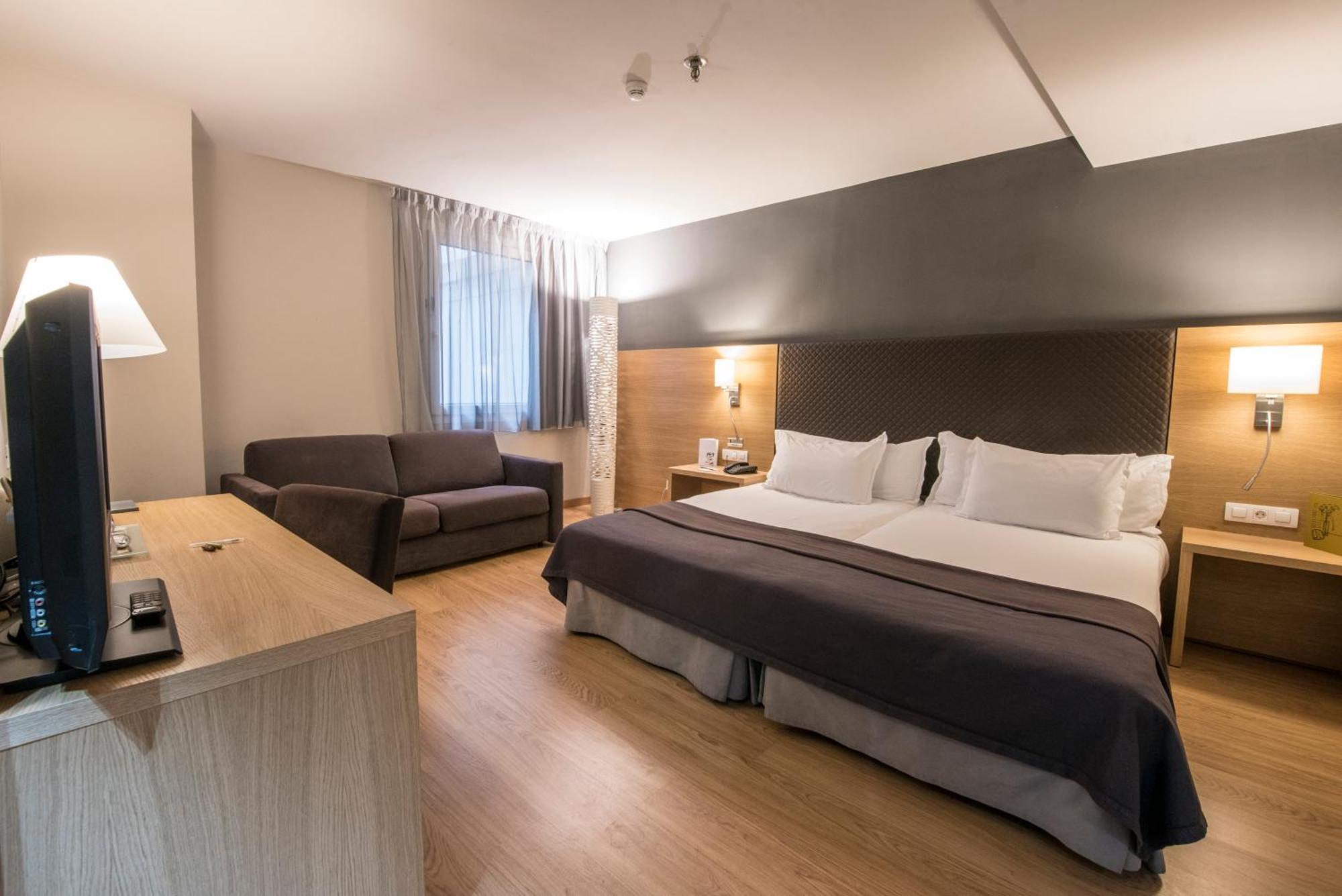 Habitación Doble Estándar con cama supletoria - 1 o 2 camas