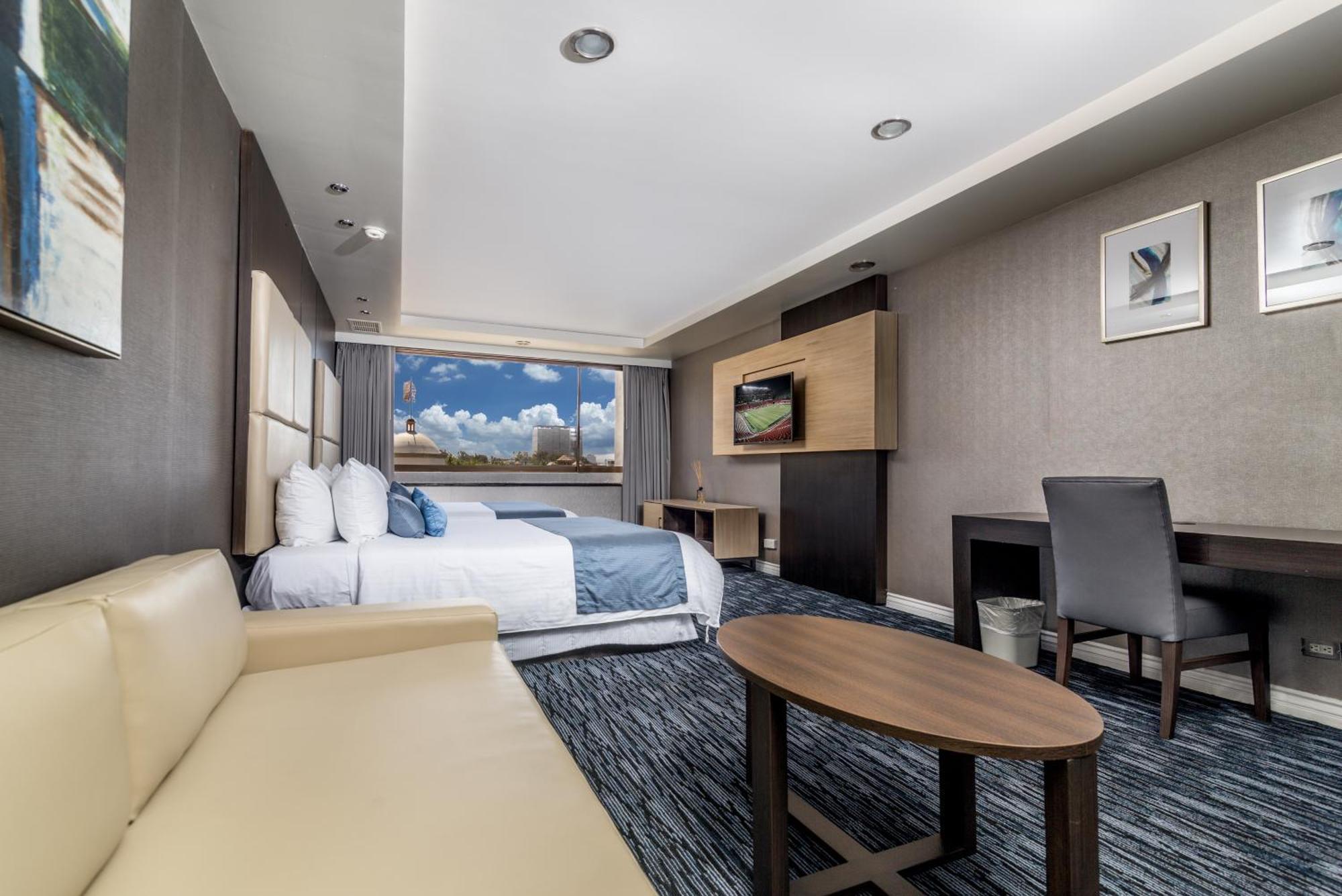 Suite con 2 camas grandes (renovadas recientemente)