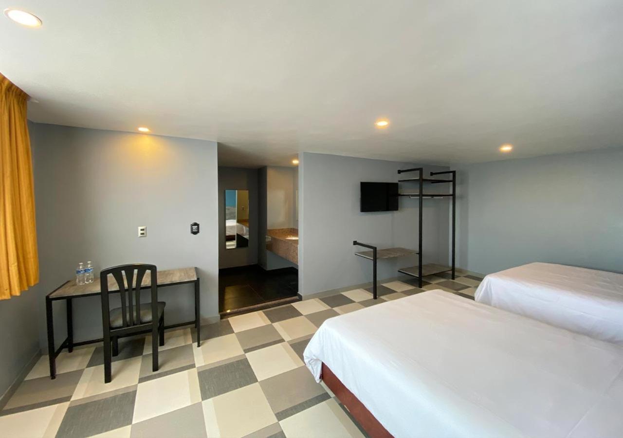 Habitación Doble Estándar con 2 camas dobles