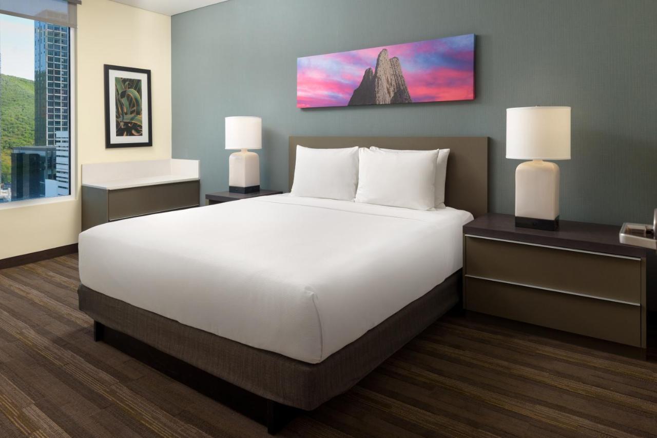 Suite con cocina, sofá cama y cama extragrande