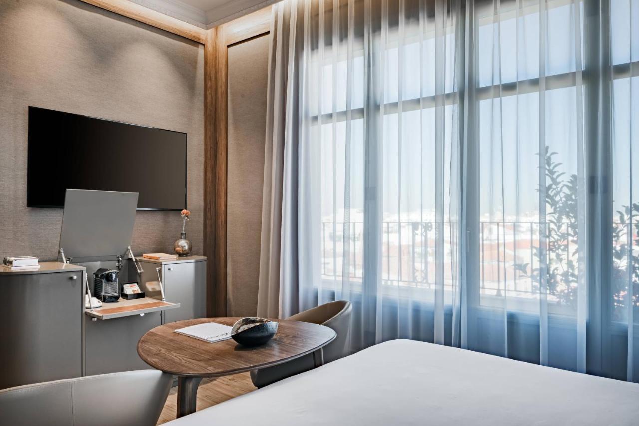 Habitación Deluxe con balcón, vistas a la ciudad y cama extragrande