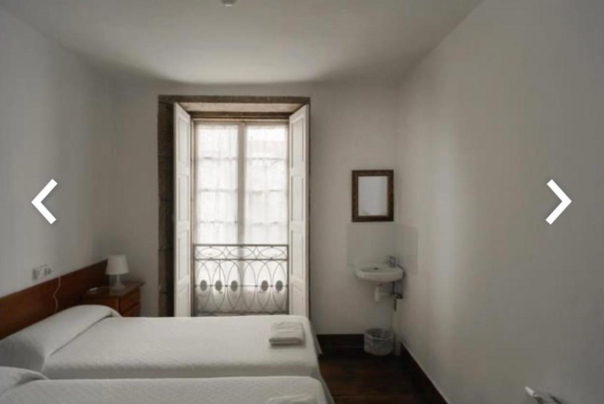 Habitación Doble con baño - 2 camas