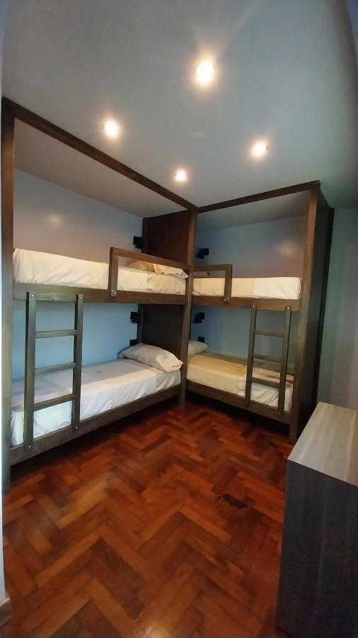 Cama en habitación compartida mixta de 4 camas