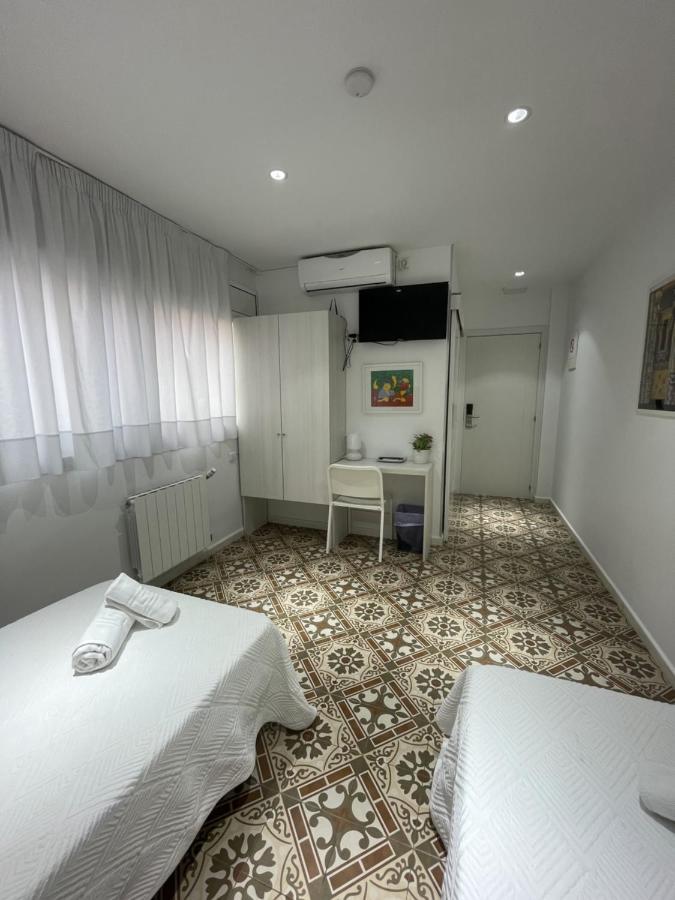 Habitación Doble con baño - 2 camas