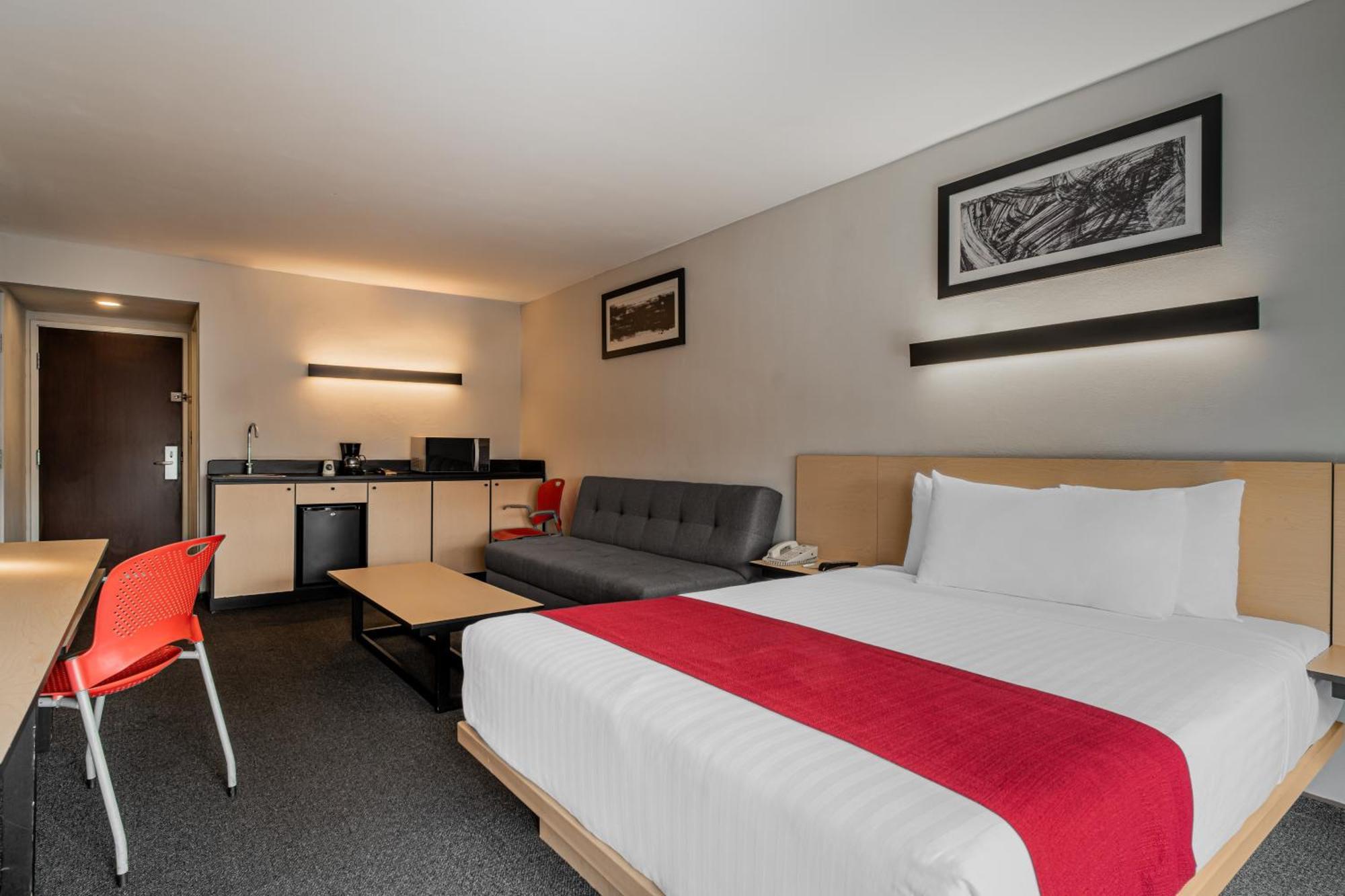 Habitación Doble Superior con sofá cama