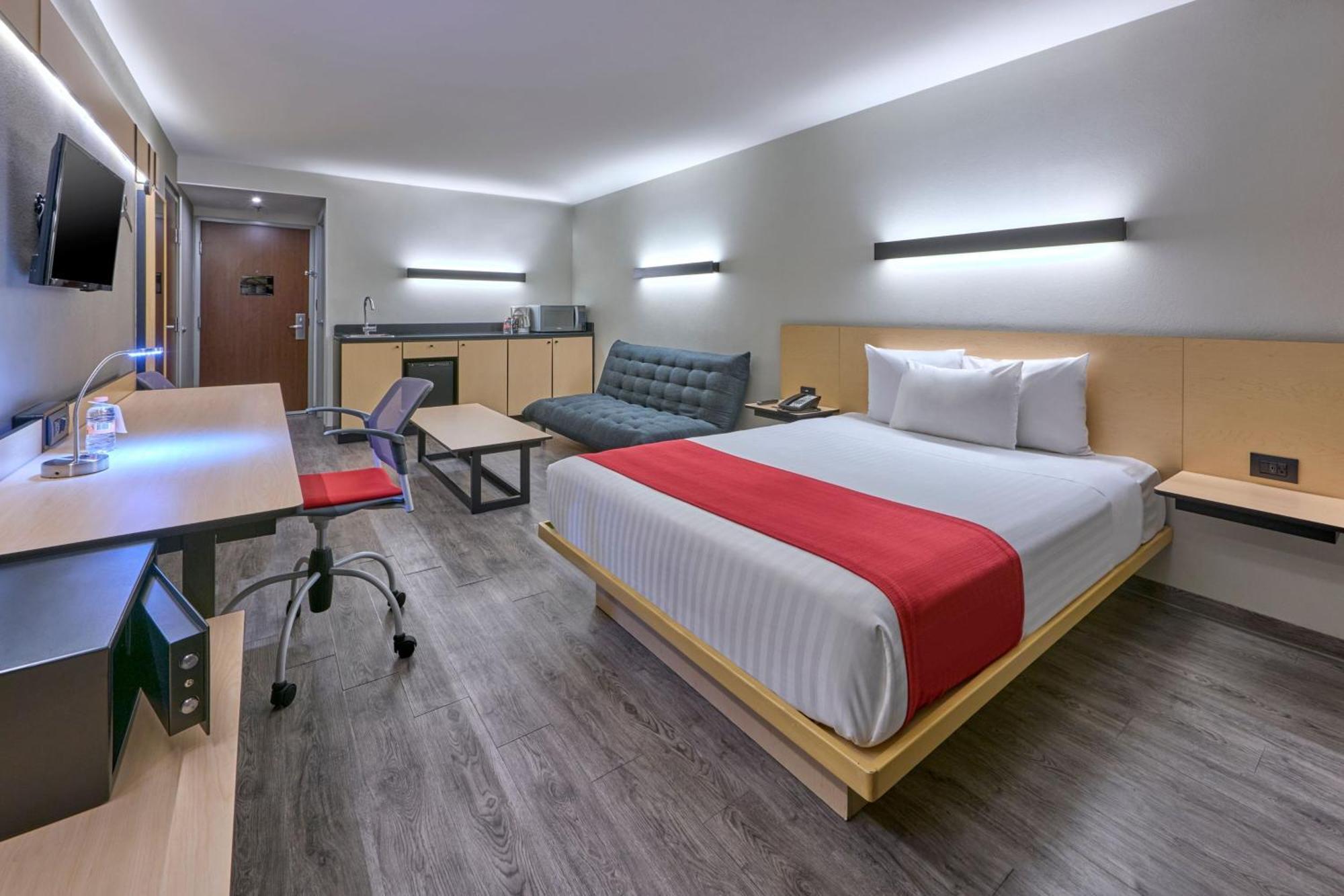 Habitación Doble Superior con sofá cama