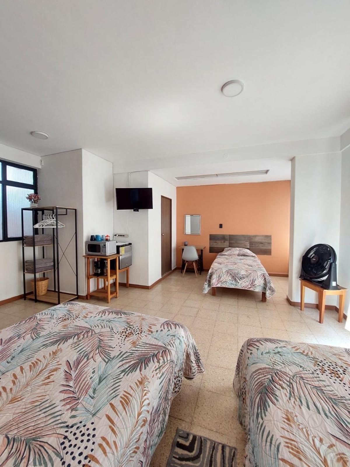 Habitación Triple con balcón