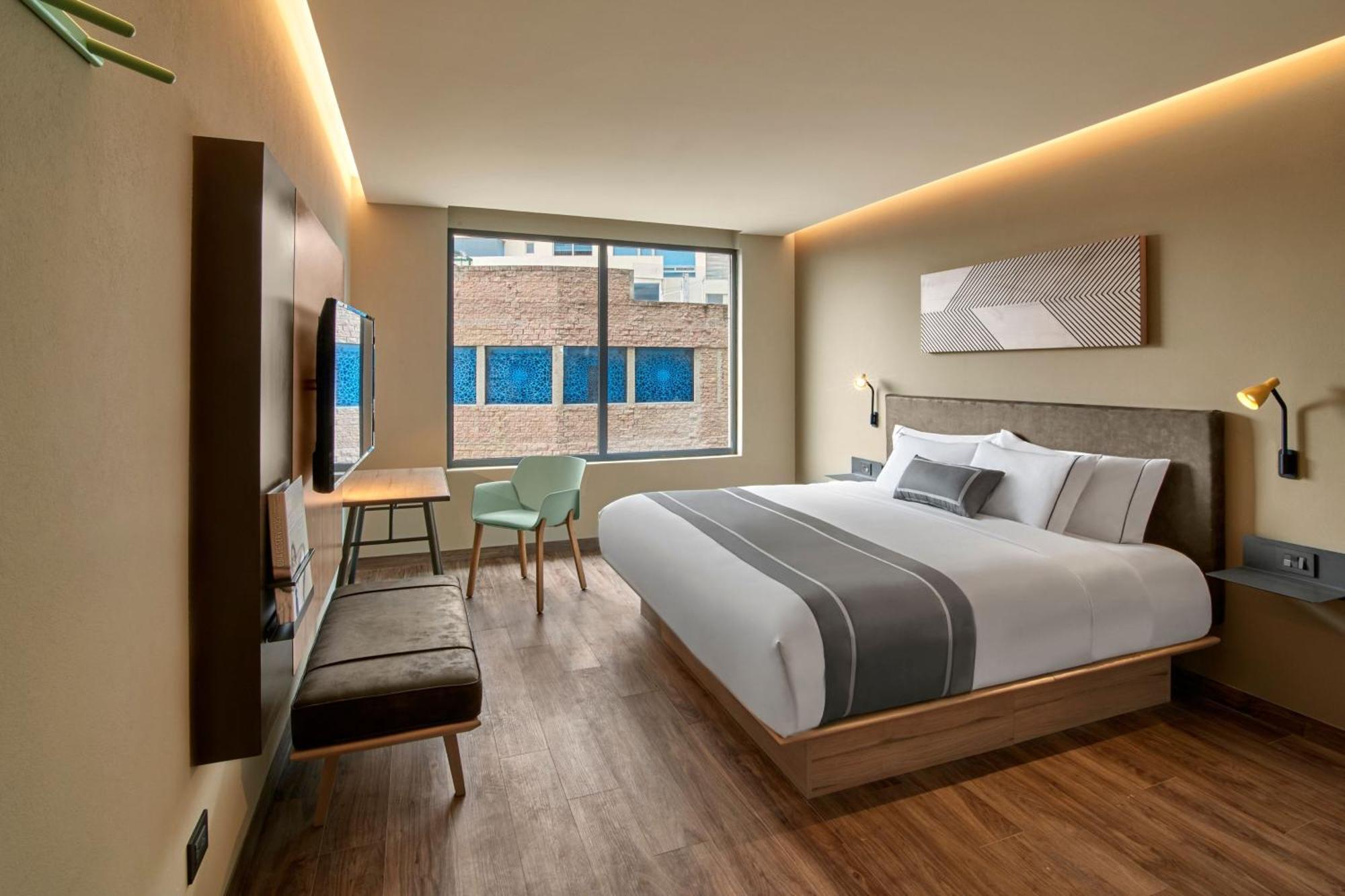 Suite con balcón y sofá cama - 1 cama extragrande