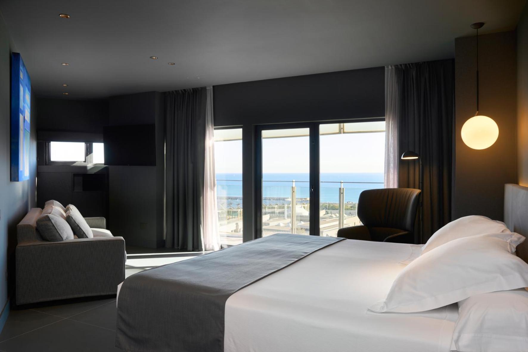 Habitación Doble Deluxe con balcón y vistas al mar
