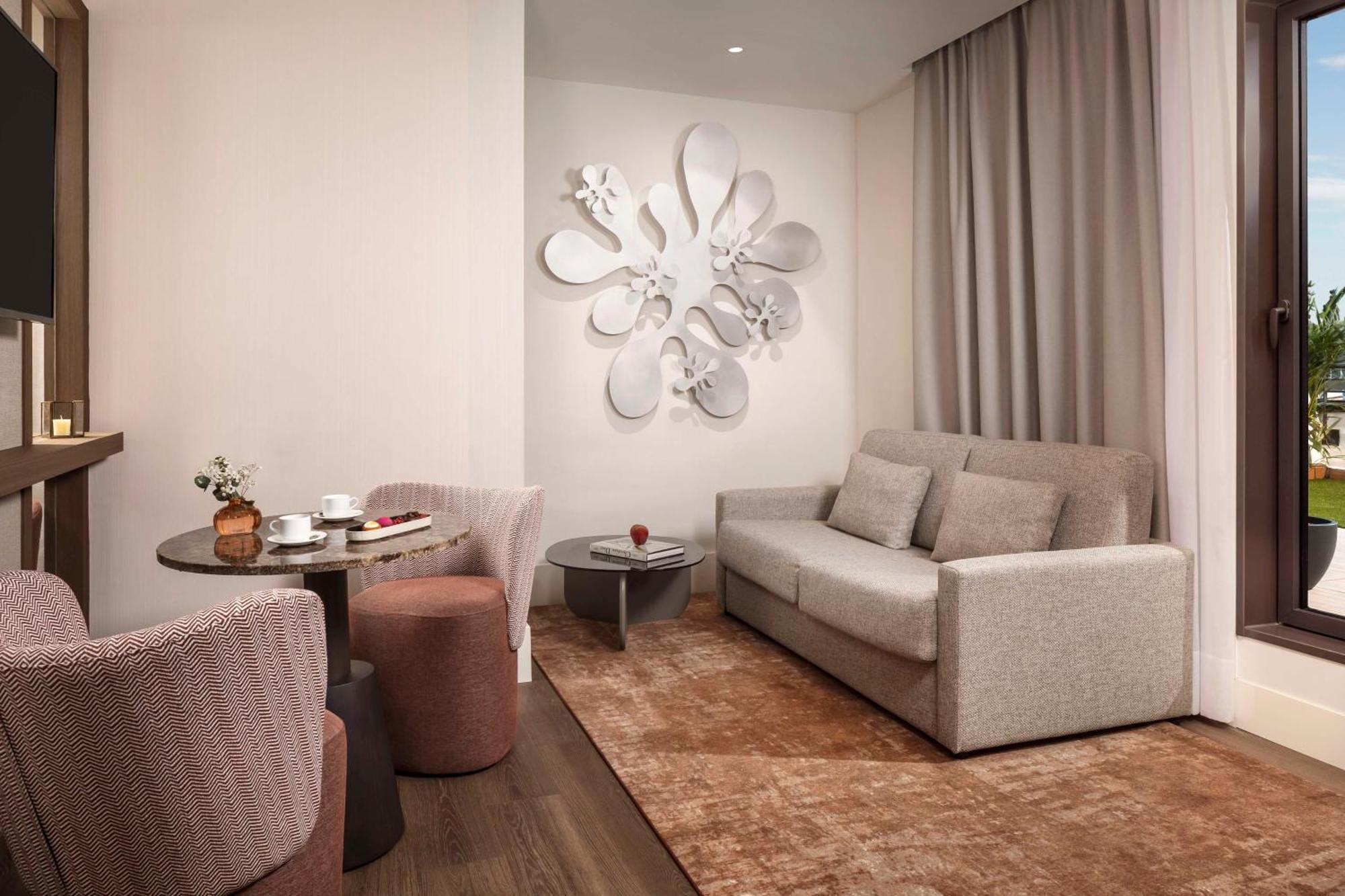 Suite con terraza y cama extra (2 adultos + 2 niños)