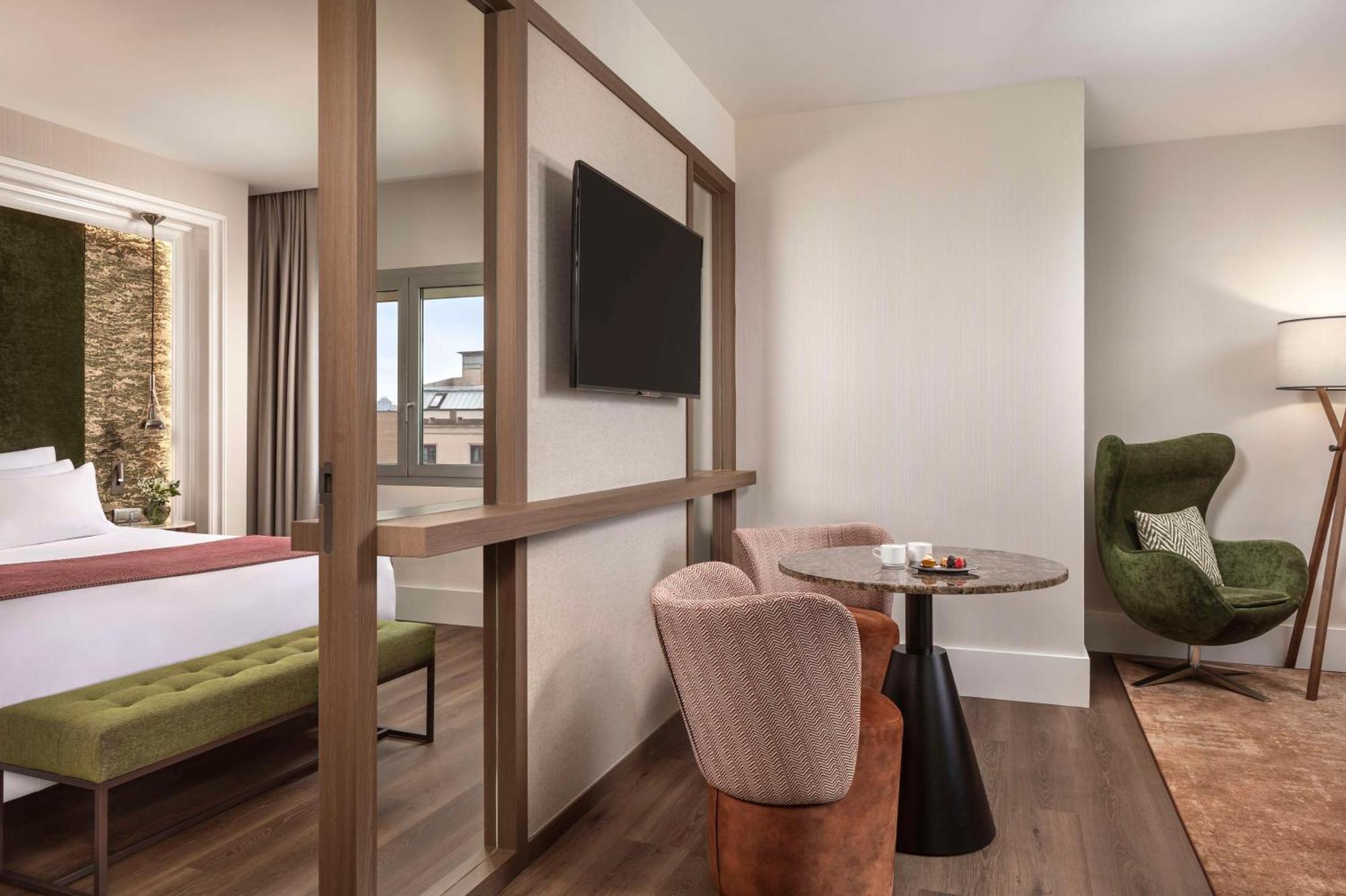 Suite con 1 cama supletoria (2 adultos + 2 niños)