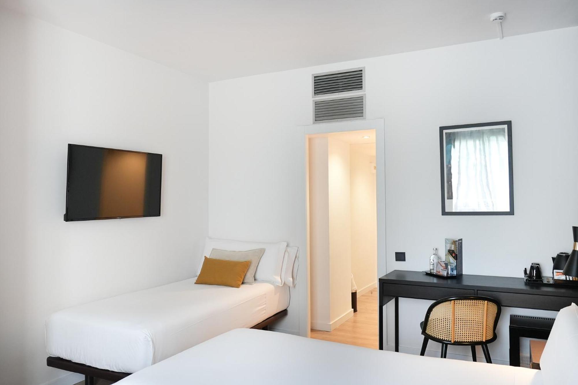 Habitación Doble (2 adultos + 1 niño)