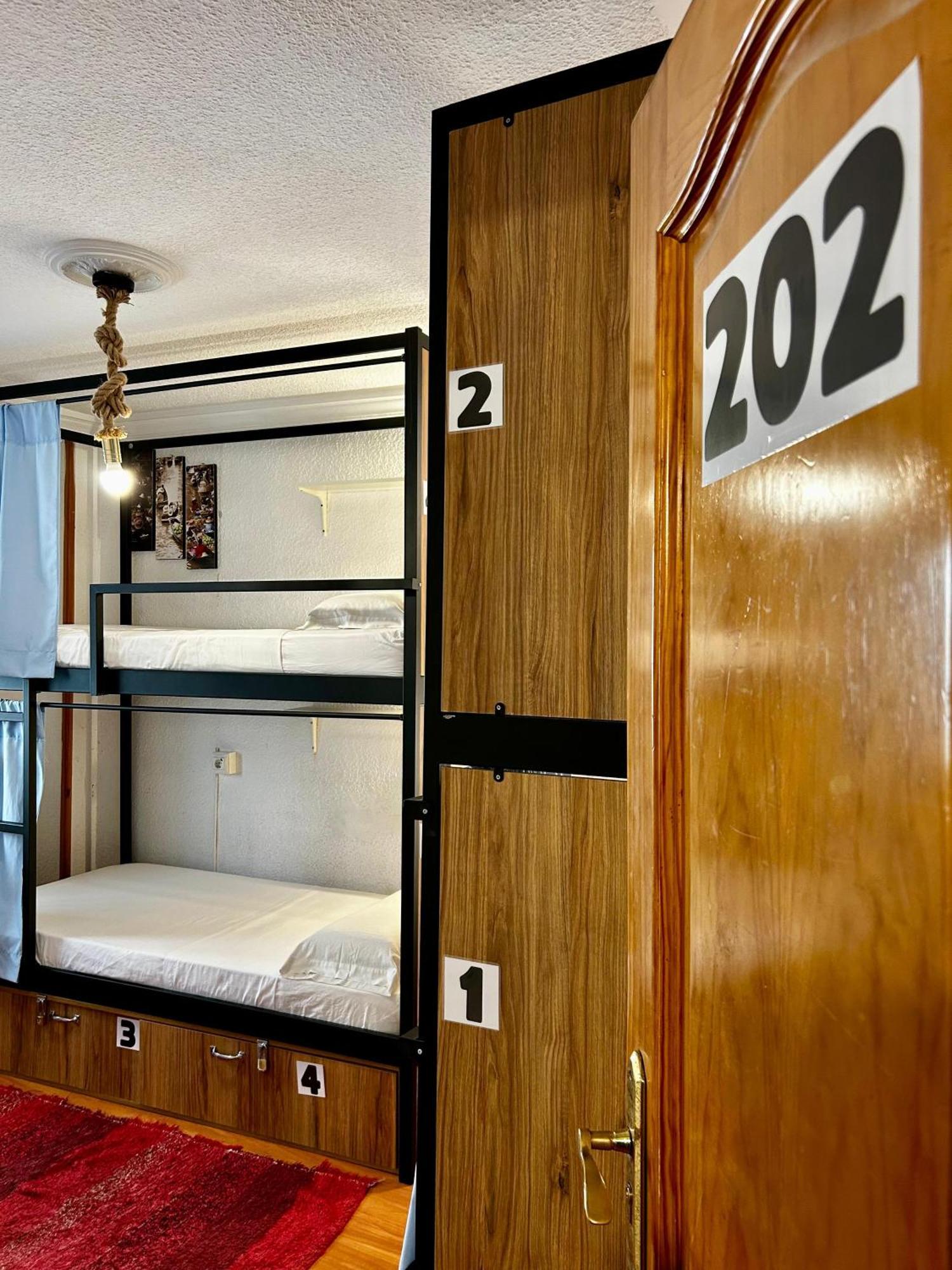 Cama en habitación compartida mixta de 4 camas