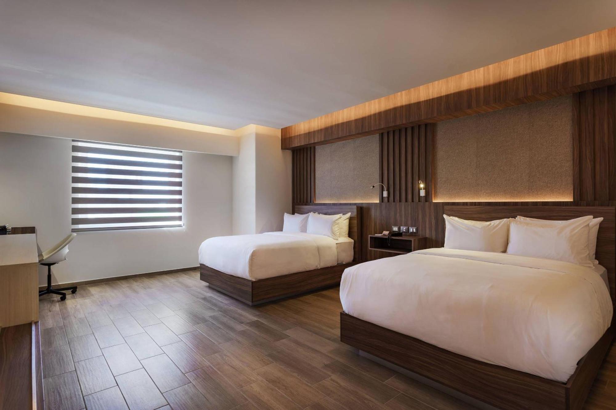 Quadruple Room with Two Queen Beds - Non Smoking/Interior Corridor