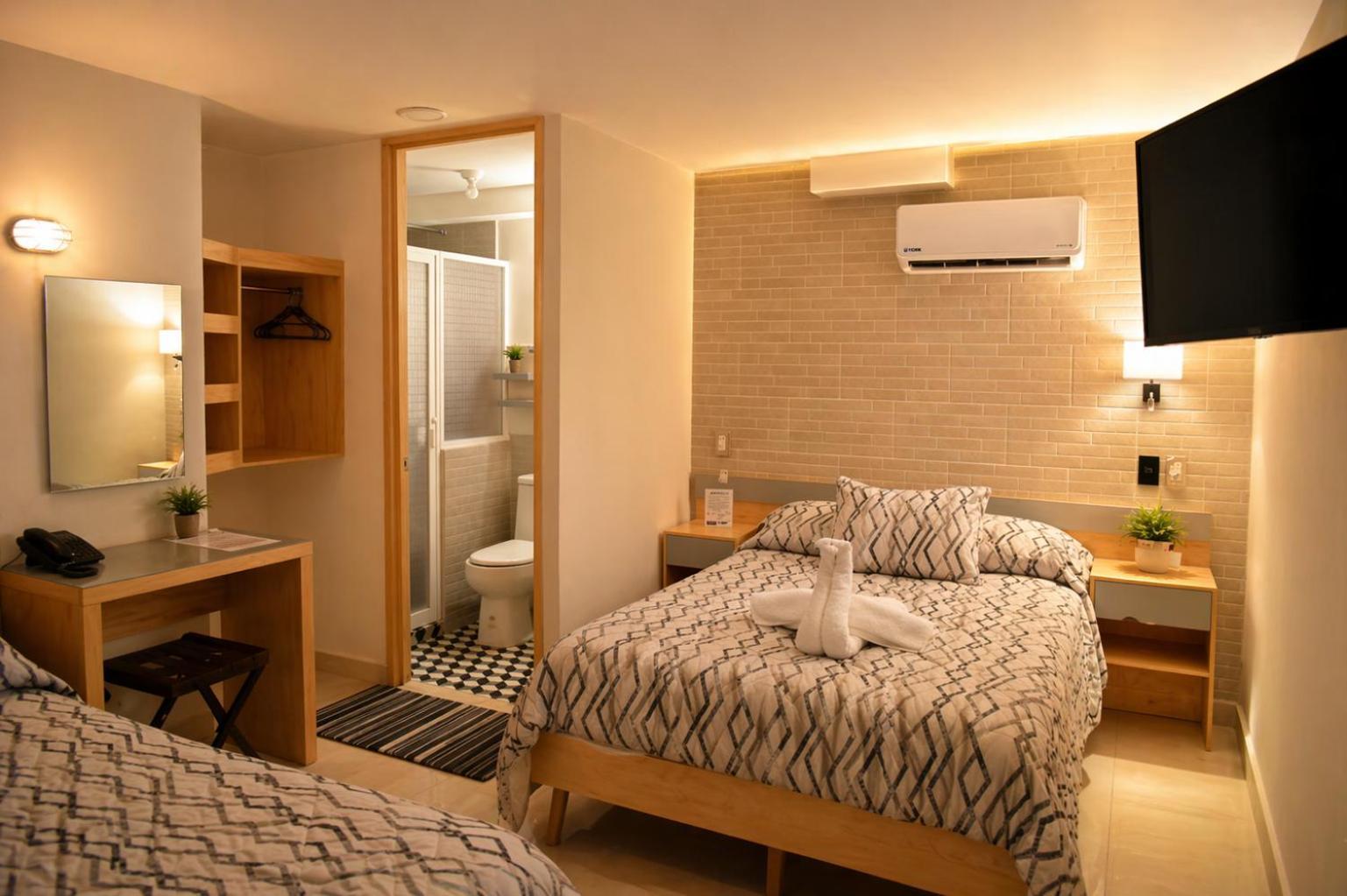 Habitación Cuádruple Confort