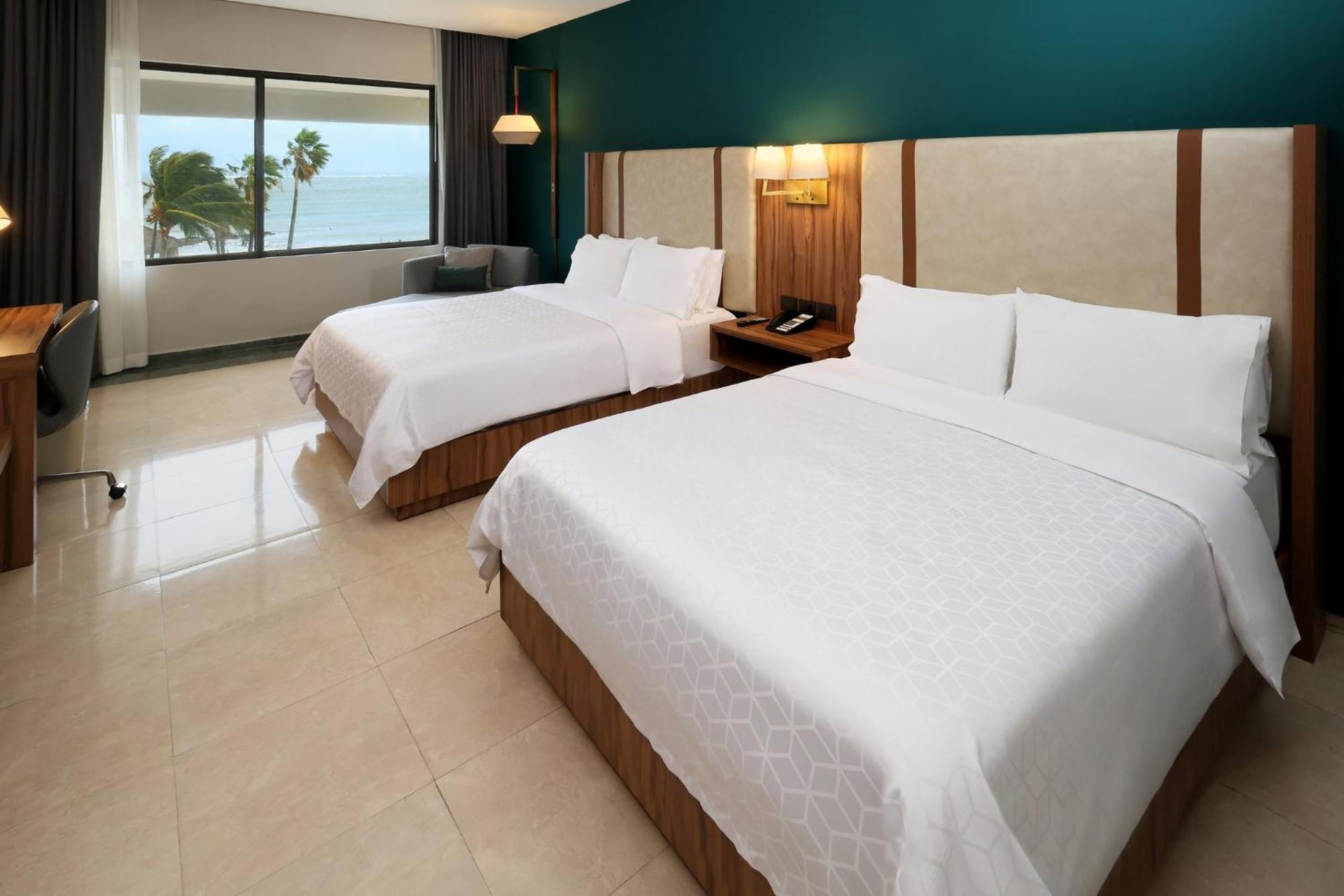 Habitación Doble Superior con 2 camas dobles y vistas al mar - No fumadores