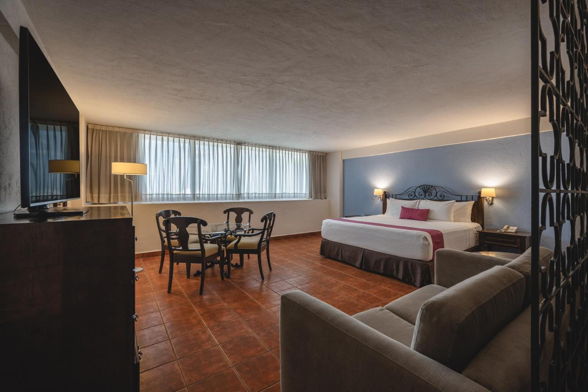 Suite Junior con cama extragrande