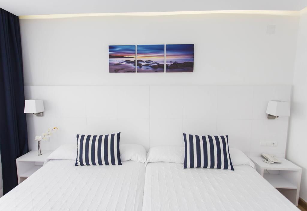 Habitación Doble Superior (2 adultos + 1 niño) - 1 o 2 camas