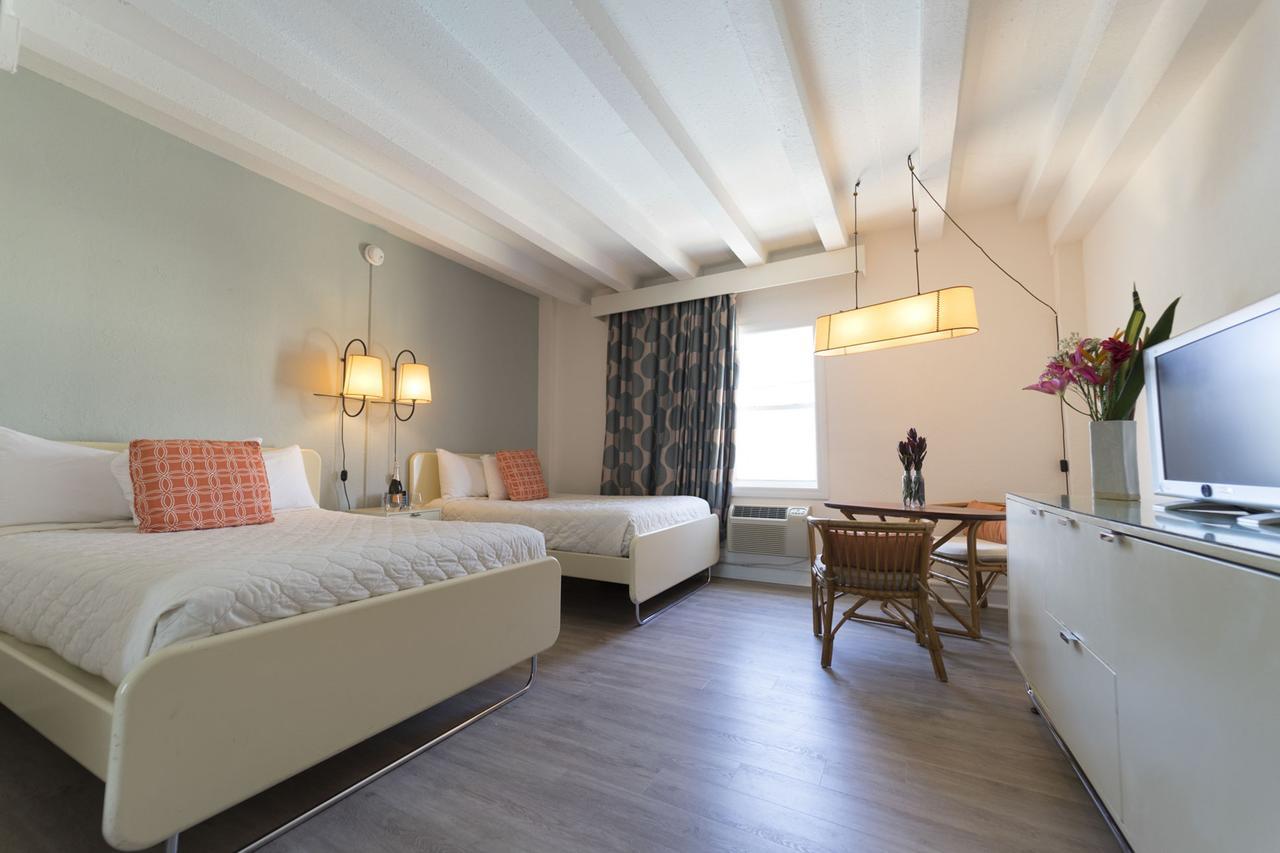 Suite con vistas al mar, 1 cama extragrande y 2 camas dobles