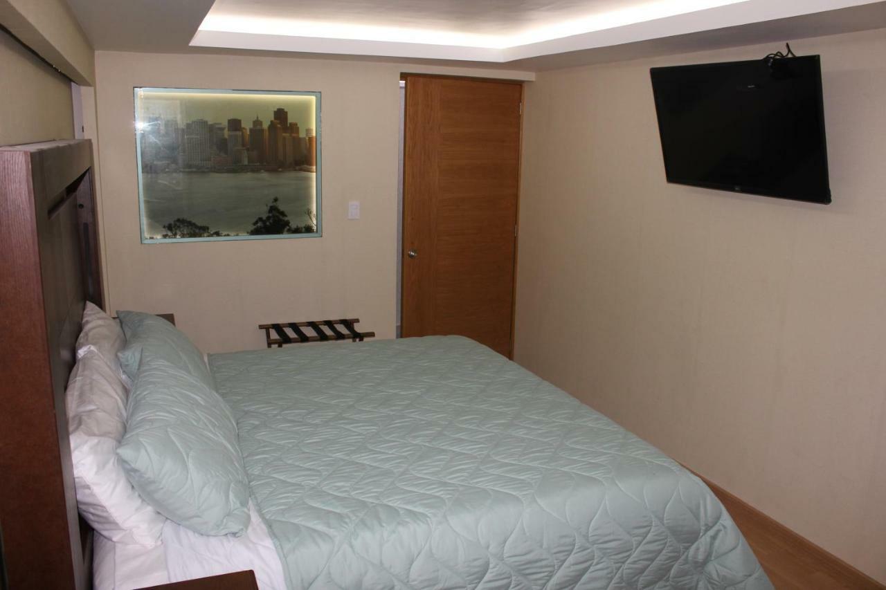 Habitación con cama extragrande.