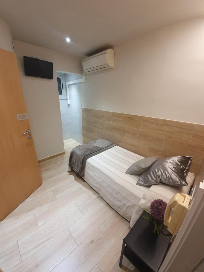 Habitación Individual con baño compartido
