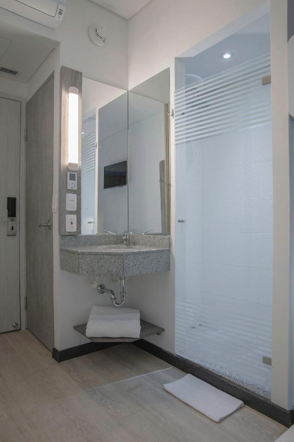 Habitación Doble con cama supletoria (2 adultos + 1 niño)