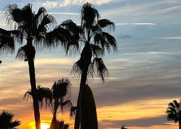 Estepona apartamento en planta baja con jardín privado y siete piscinas
